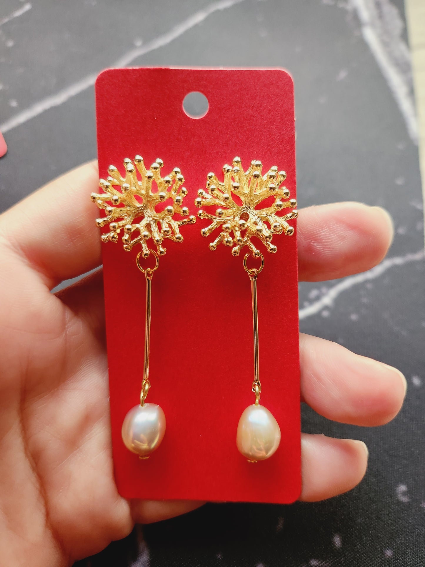 Pearl earrings with gold sea anemone