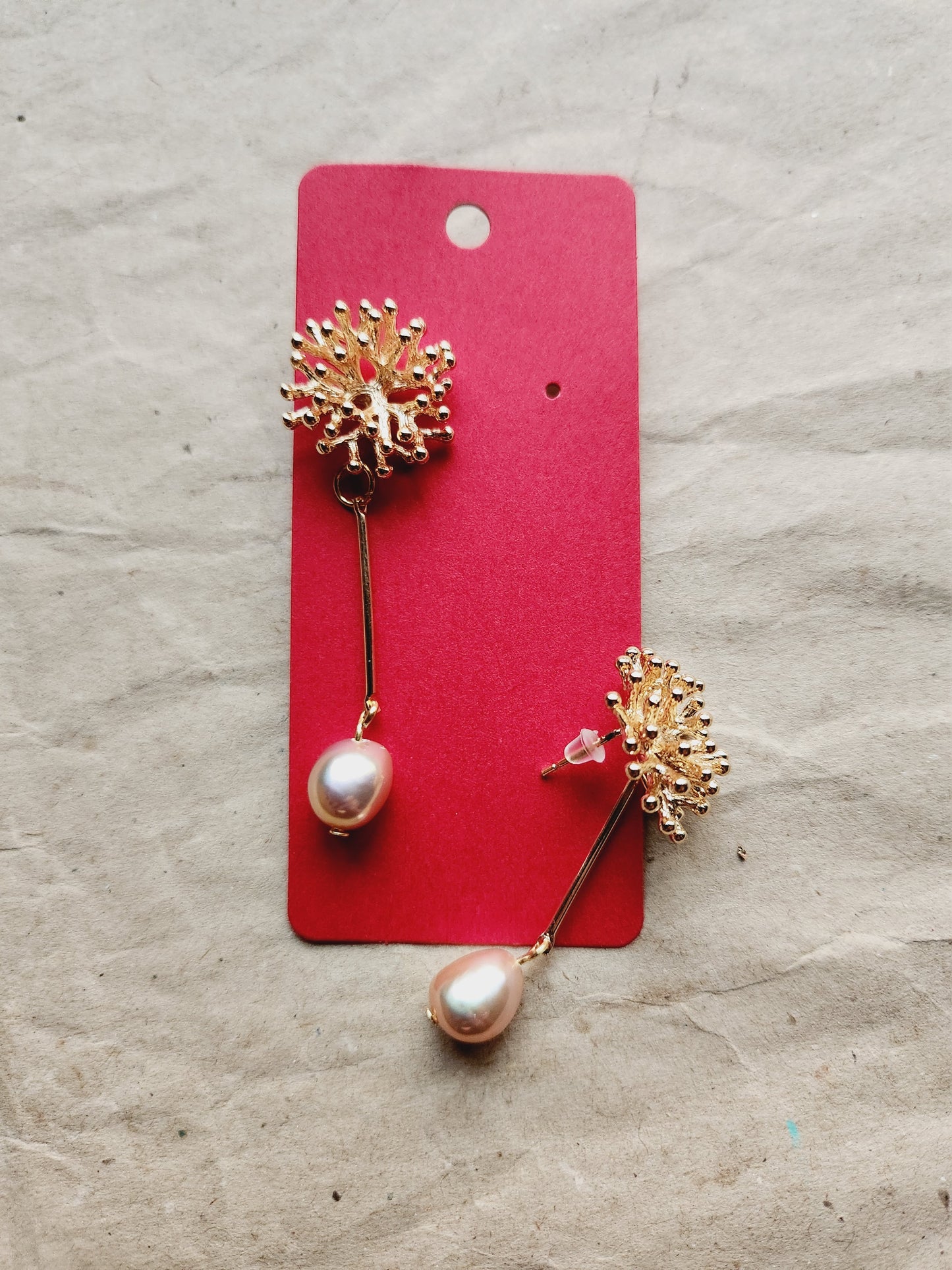 Pearl earrings with gold sea anemone