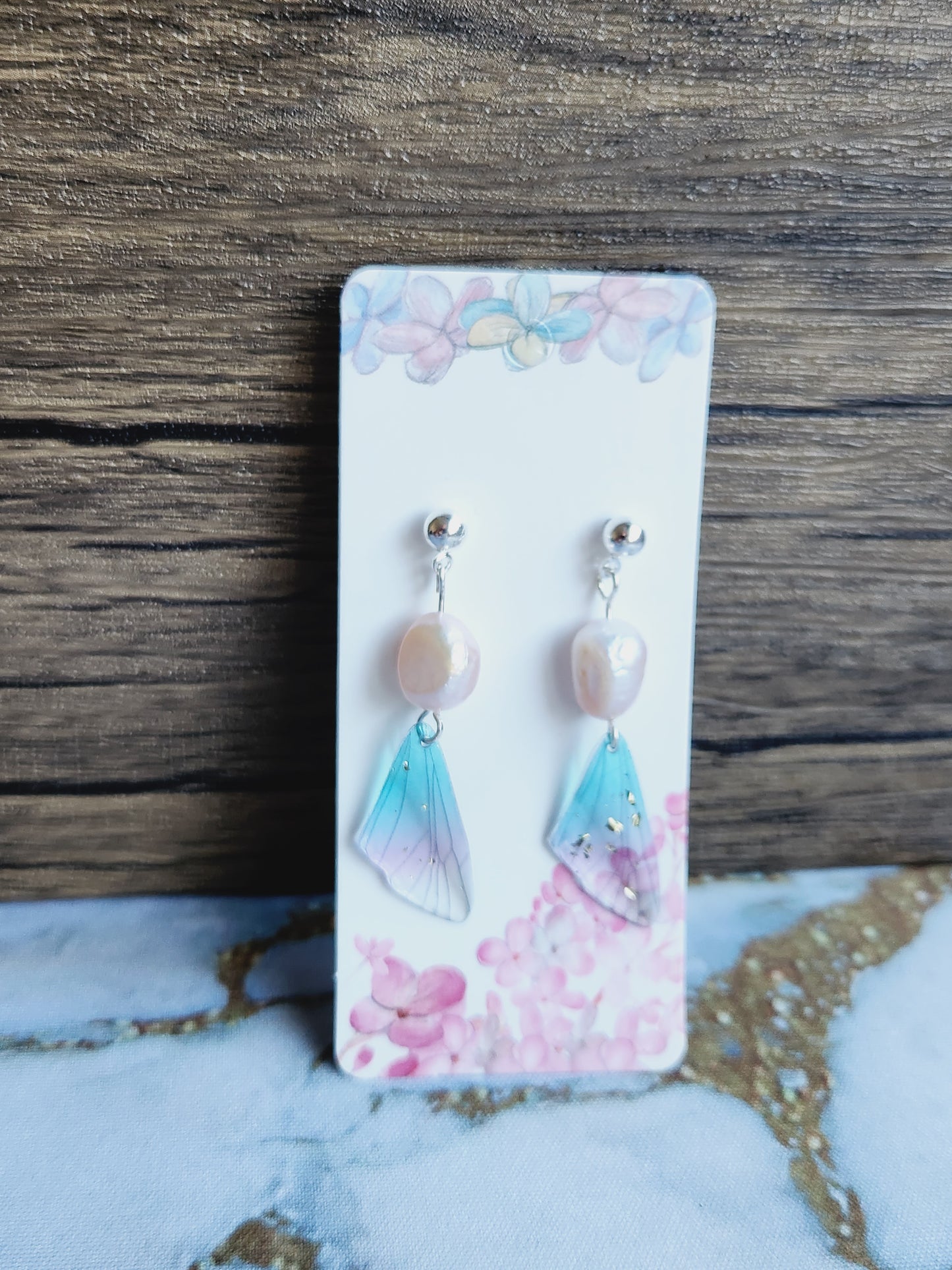 Pearl earrings in fairy wings